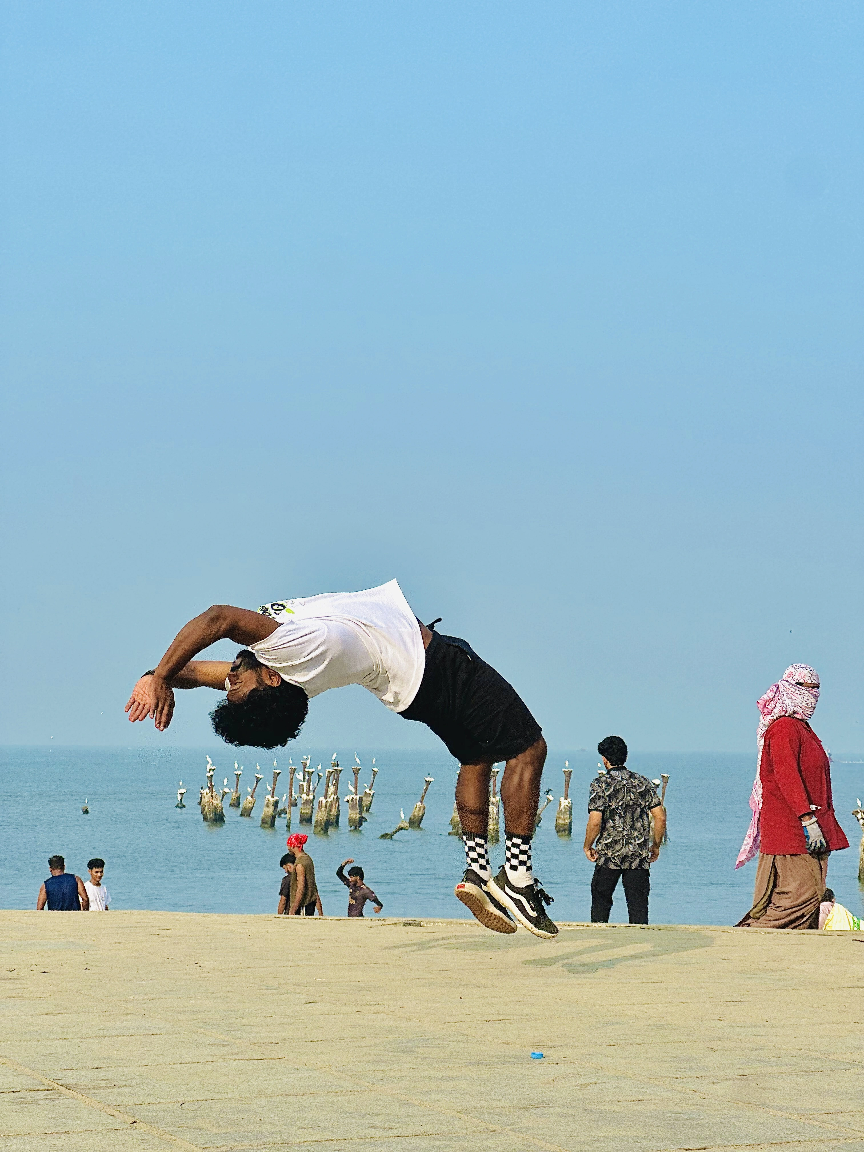 Coach Renjith sunset coastal backflip at Calicut Beach